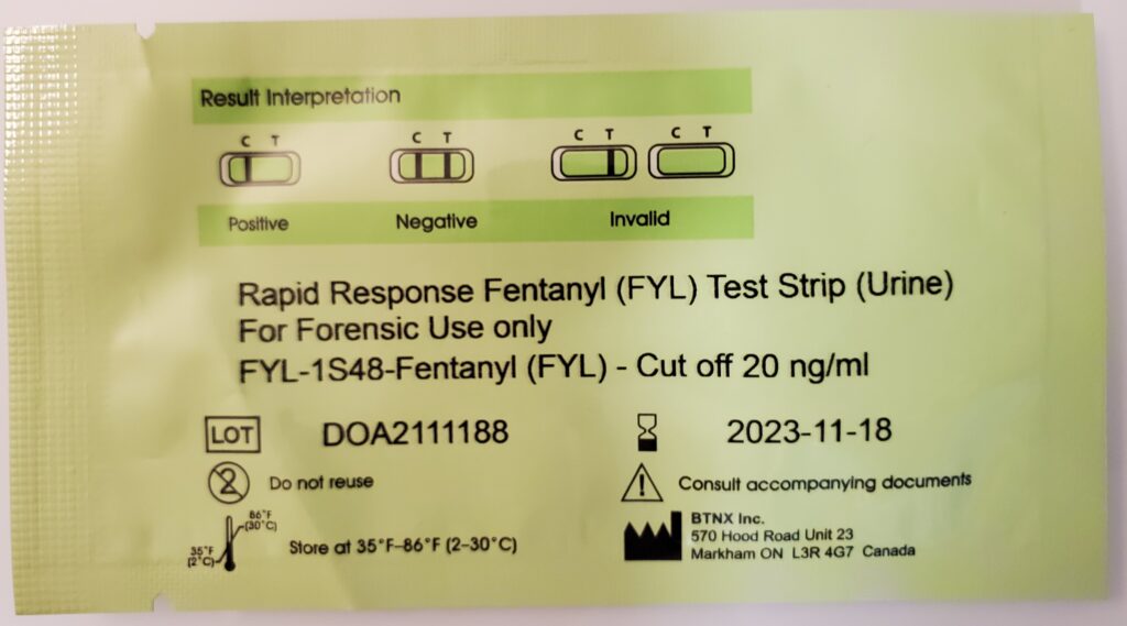 Image of Fentanyl Test Strip with results to look for. One line on left is positive for the presence of Fentanyl, two lines is negative for presence of Fentanyl, and one line on right is invalid. It is similar to the Covid test strip