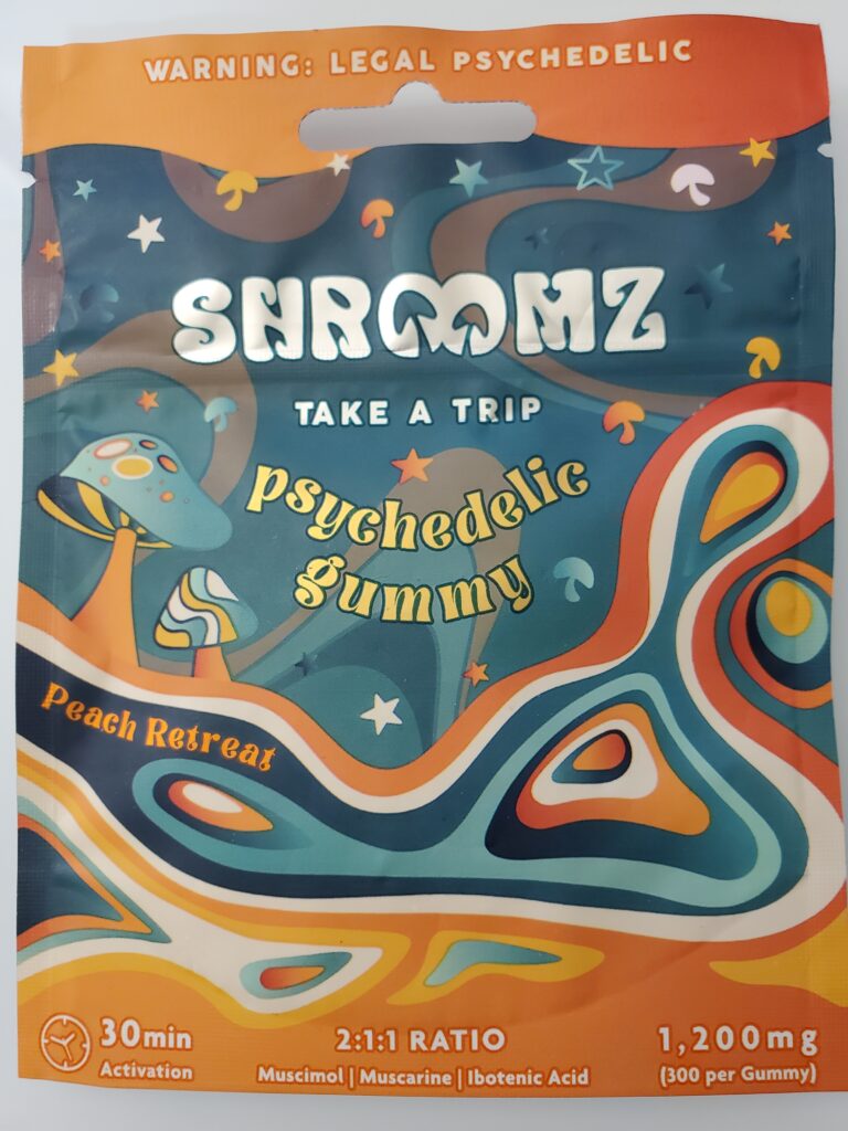 Image is a bag of SHROOMZ brand psychedelic gummy. Says 30 min activation, 1200mg, 300 per gummy, of 2:1:1 ratio of Muscimol:Muscarine:Ibotenic Acid