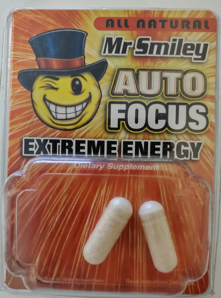 Image is packet of AUTO FOCUS Extreme Energy with 2 white capsules in it. Listed as dietary supplement.